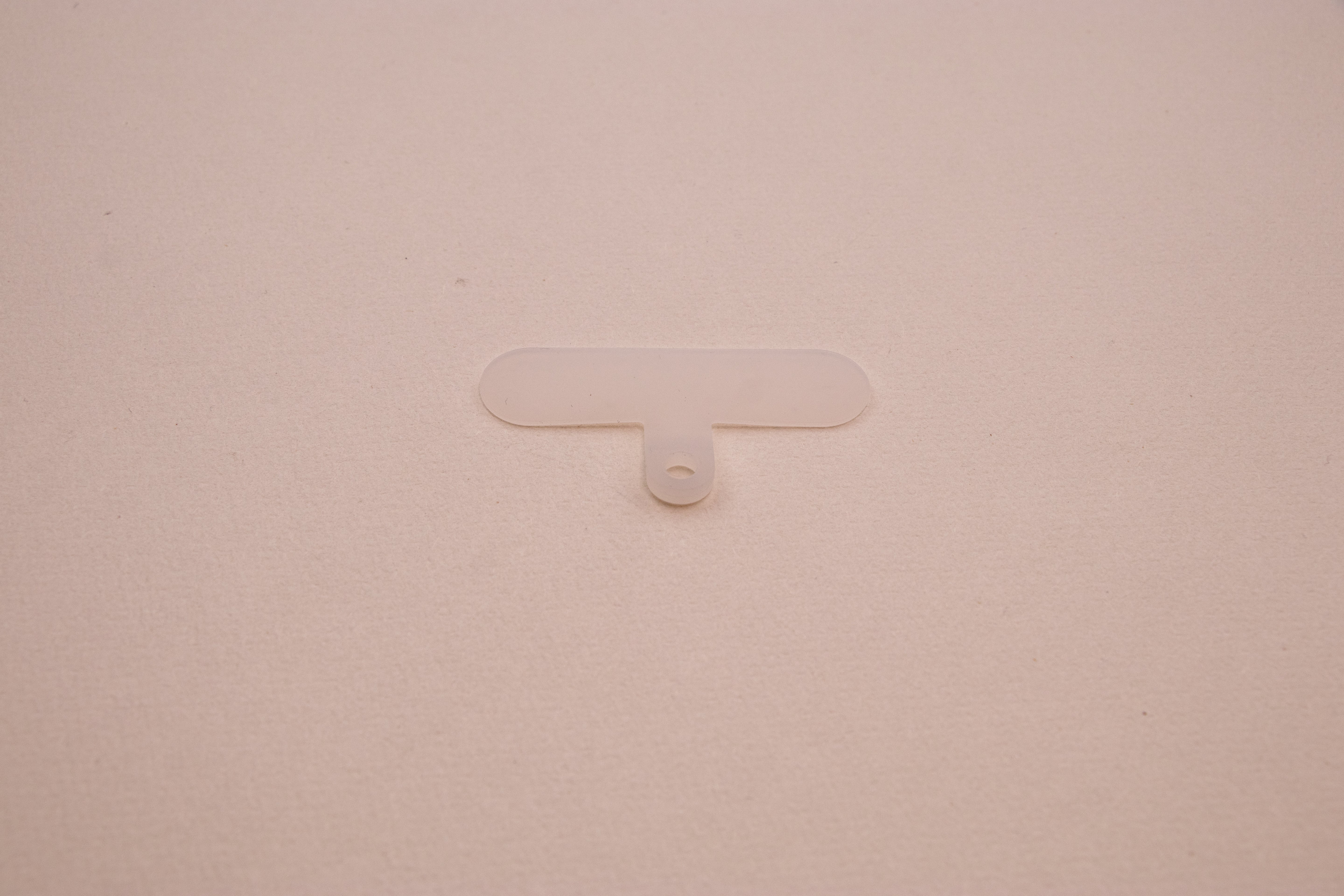 Clear phone tether tab included with beaded phone charm