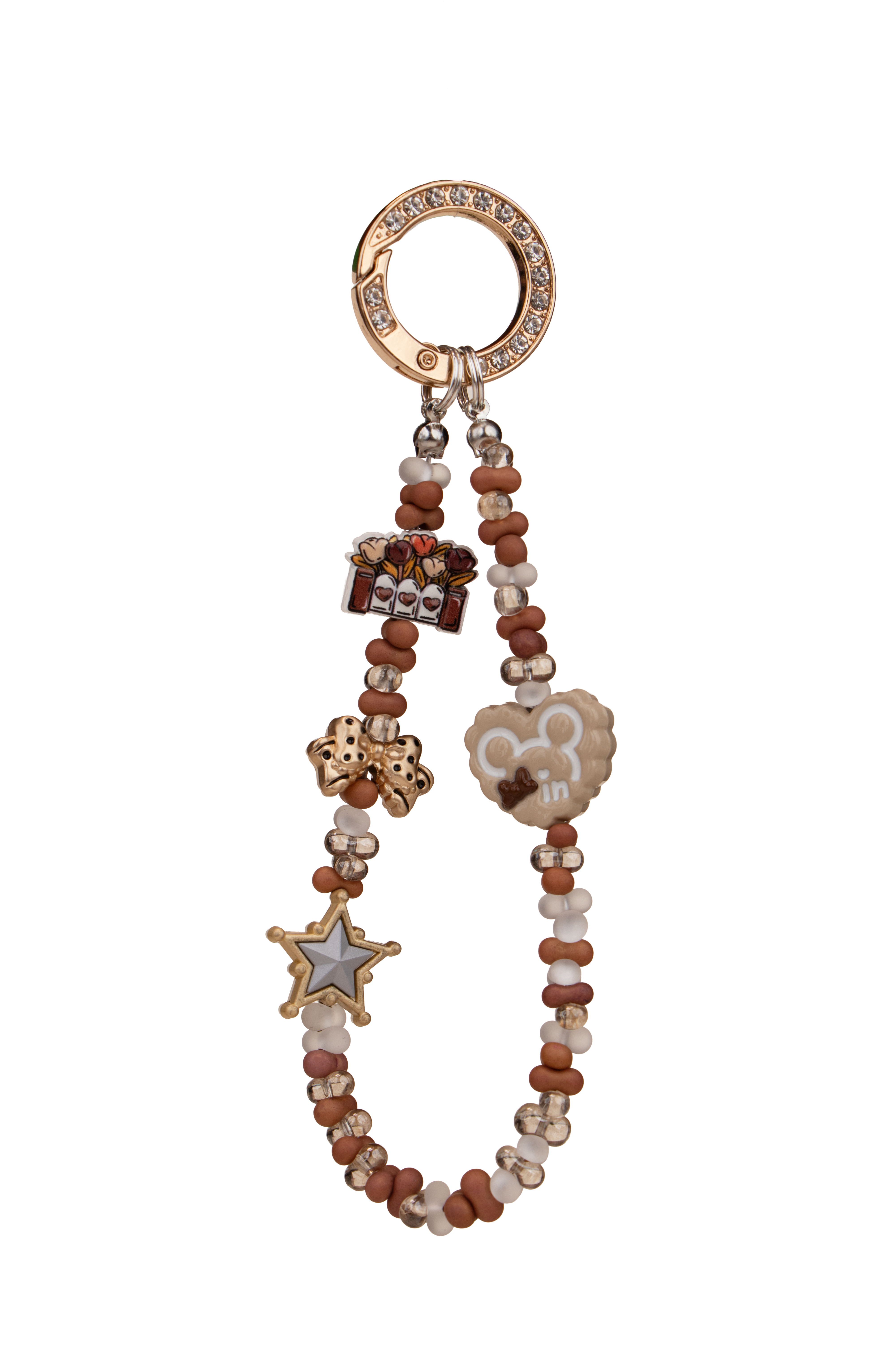 Little Luck phone charm with earthy beads and gold-tone ring on phone case