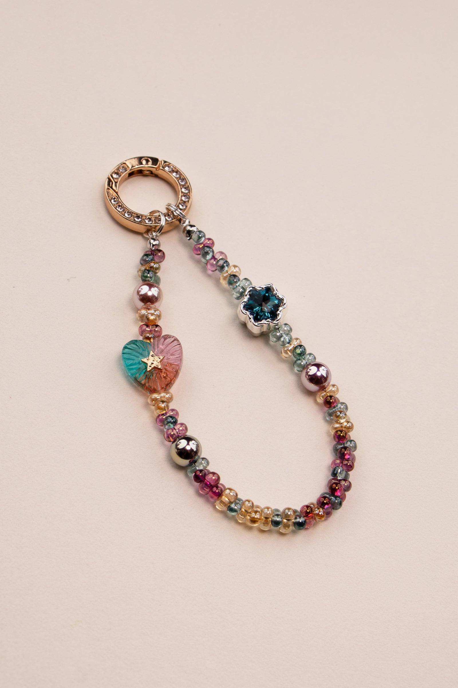 Daydream Heart beaded phone charm attached to phone with tether tab