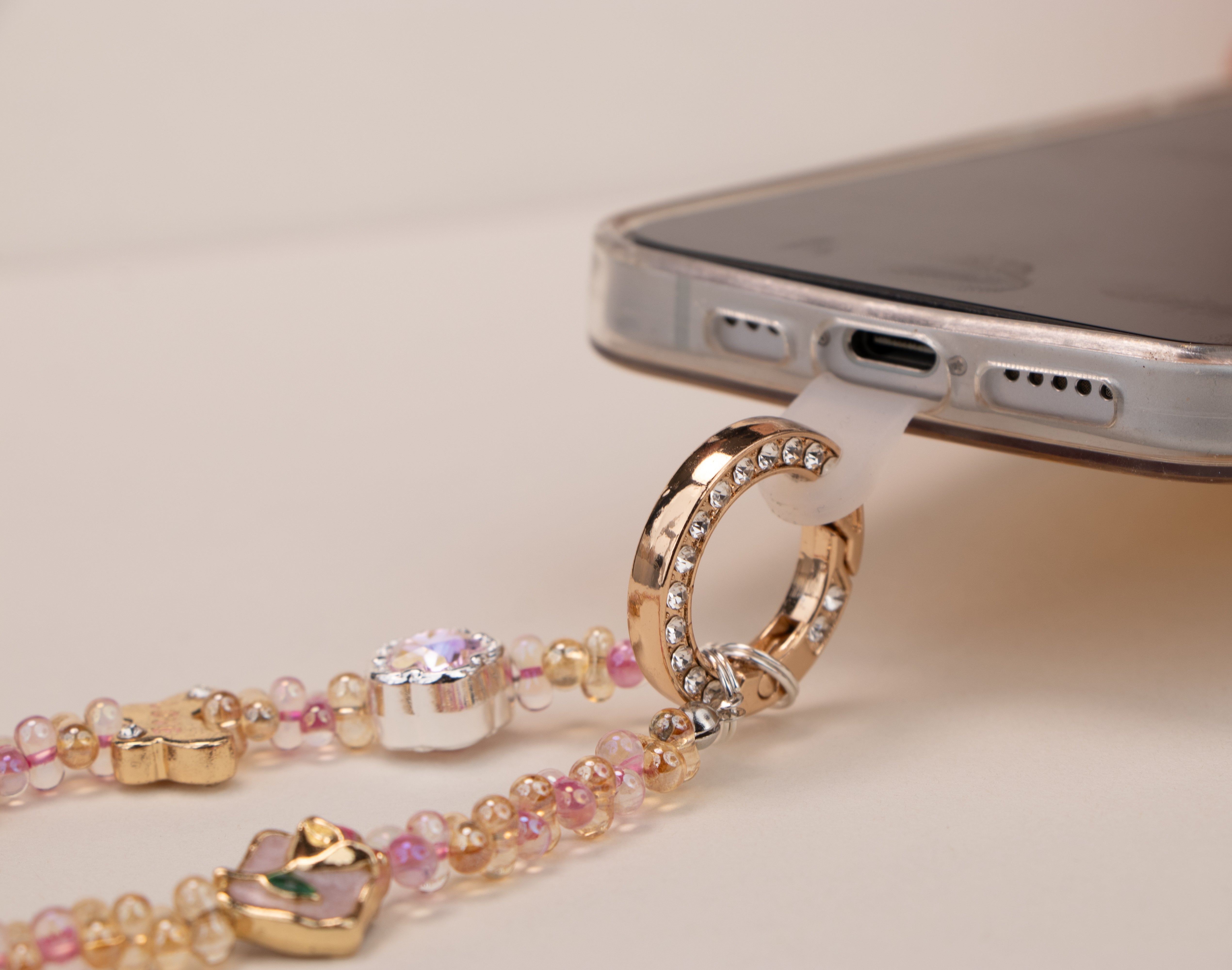 Soft Love beaded phone charm with heart butterfly flower and gold-tone ring